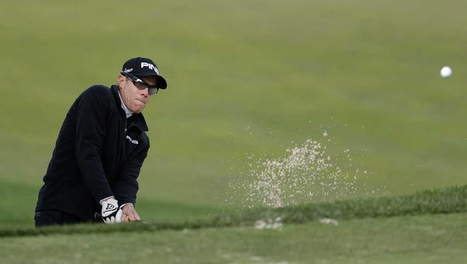 Nick O'Hern hits the ball out of a bunker for an eagle on the 10th hole of the Monterey Peninsula Country Club Shore Course during the second round of the AT&T Pebble Beach Pro-Am golf tournament Friday, Feb. 8, 2013 in Pebble Beach, Calif. (AP Photo/Eric Risberg)