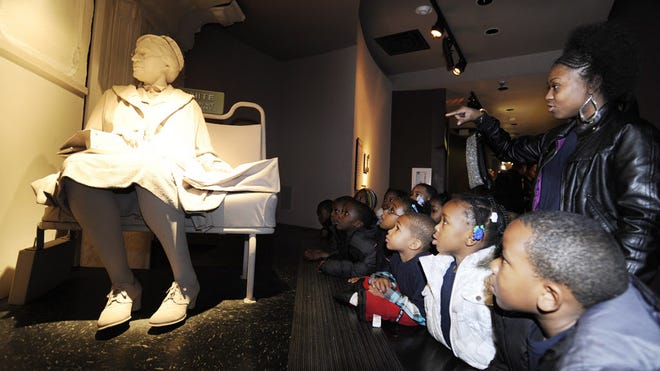 JOE SONGER | AL.COM | ASSOCIATED PRESS | FILE
Children gather Jan. 13, 2012, around the Rosa Parks bus exhibit at the Birmingham Civil Rights Institute. The institute states its broad mission is “to promote civil and human rights worldwide through education.”