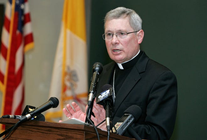 Bishop David J. Malloy speaks during a news conference Monday, Feb. 11, 2013, about the resignation of Pope Benedict XVI.
