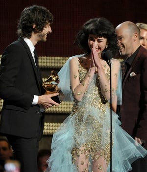 Gotye, left, and Kimbra accept the award for record of the year for "Somebody That I Used to Know" at the 55th annual Grammy Awards on Sunday, Feb. 10, 2013, in Los Angeles.