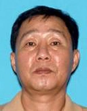 Lower Southampton police say Dae Sik Woo cashed counterfeit checks via ATM into his own account.