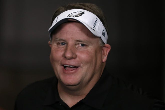 New Eagles coach Chip Kelly sports a visor with the team logo after his Jan. 17 news conference.
