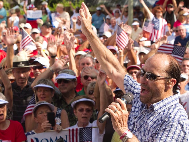 Country singer Lee Greenwood, shown here performing at a rally for vice presidential candidate Paul Ryan in The Villages on Aug. 18, will peform at the Santa Fe College President's Dinner on Feb. 22.