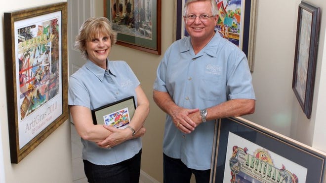 Barbara and Brian Cottrell in their Palm Beach Gardens home, surrounded by artwork they’ve collected during their years of involvement with Artigras. (Taylor Jones/The Palm Beach Post)