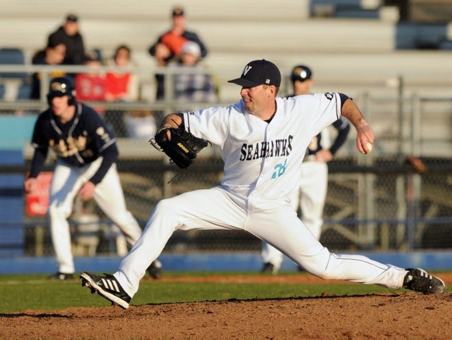 UNCW starter Mat Batts (28) pitches during the Seahawks' season opener against Kent State at Brooks Field on Friday, Feb. 15, 2013.