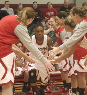 Monmouth College's Zipporah Williams is announced during Senior Day at Glennie Gym. The Fighting Scots went on to defeat Lake Forest 97-62 and improve to 19-4 on the season.
