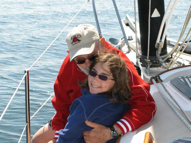 In this Aug. 7, 2011, photo, Nina Shelanski, 11, and her grandfather, Jerry Schwartz, enjoy a quiet moment during a family sailing trip in Blaine, Wash. Schwartz has cared for his granddaughter while her parents took a rare vacation without her, but it can be challenging for couples looking to get away without their children to line up help from relatives or sitters.