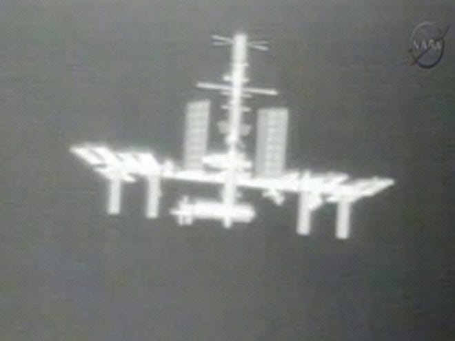his Thursday, May 24, 2012 image made from video provided by NASA-TV shows the International Space Station taken from the thermal imaging camera aboard the SpaceX Dragon commercial cargo craft as it approaches the station. (AP Photo/NASA)