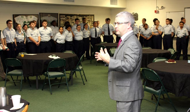 Rep. Patrick McHenry talks to the JROTC class at Ashbrook High, his alma mater. McHenry visited the school Wednesday before touring Stuart W. Cramer High, which is slated to open this fall.