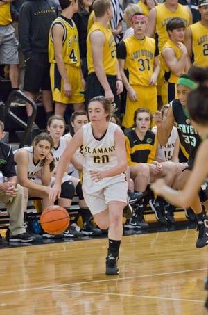 St. Amant's Kara Gremillion leads a fast-break in the Lady Gators' 43-42 first-round win over Lafayette. Photo by Dewey Keller.