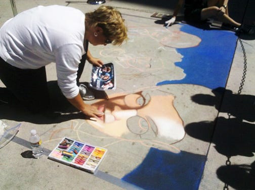 Lee Jones draws during the Utah Foster Care Foundation's 9th Annual Chalk Art Festival in Salt Lake City on June 17, 2011. The artist also has participated in festivals across the U.S. and at Downtown Disney in Orlando. She will be in St. Augustine Feb. 23 demonstrating sidewalk chalk drawing, and will participate in the March 22-24 St. Augustine Chalk Walk.