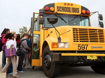 Student catch the bus home at Jinks Middle School in Panama City earlier this month.