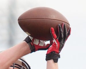 Football being caught