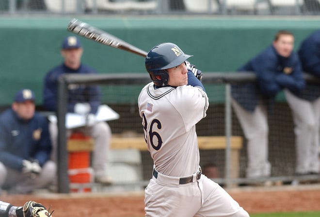 Navy infielder Chris Campbell drives the ball against Air Force in Game 1 of the Freedom Classic on Friday.