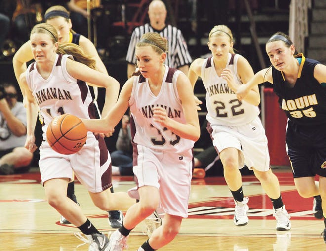 Morgan VanHyfte (33) pushes the ball up court for the Bravettes in Friday's state semifinal game.