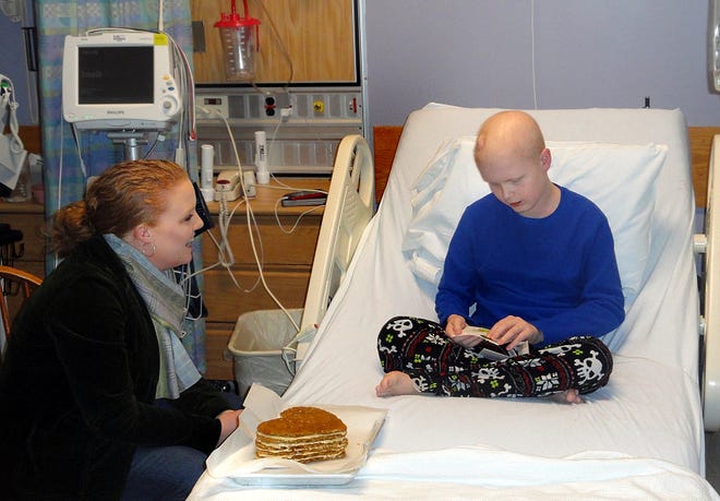 Celebrity Chef Tiffani Faison, a finalist of Bravo’s “Top Chef” asked Nicholas Claudio, of Mattapoisett, to be her Valentine by plying him with sweets in his bed at Tufts Medical Center’s Floating Hospital for Children in Boston.