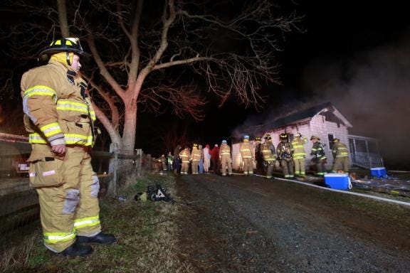 The home of Tommy Terry and Pam Hamrick on Burke Road in Shelby is shown burning late Thursday night. The fire destroyed possessions and killed two dogs.