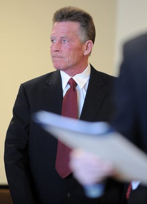 Former Watertown Police Sgt. Joseph Deignan appears in Marlborough District Court Tuesday morning with his attorney, Michael Brennan. The case was continued to March 29.