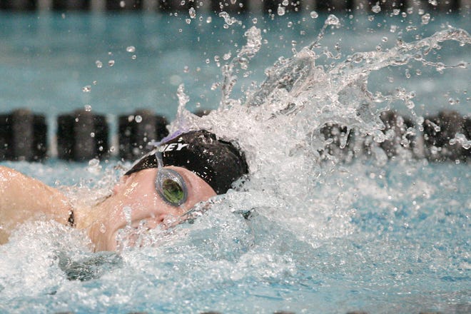 Jackson's Chase Kinney sets a state tournament record in the 100 free with a time of 49.7 in the State Swim Meet D1 Prelims Friday.