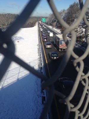 Traffic seen from the Route 24 exchange proceeds slowly on Interstate 495 north Monday morning after at least one vehicle lost control and crashed about 8 a.m. One person was killed.