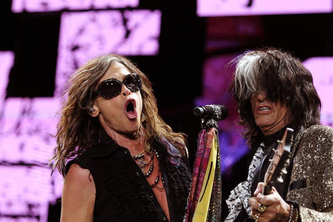 Aerosmith's Steven Tyler, left, and Joe Perry perform during the opening night of the Global Warming Tour at the Target Center in Minneapolis on Saturday June 16, 2012.