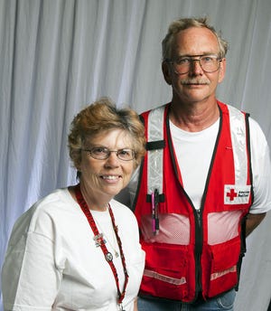 Paul and Kathy Strong are veteran American Red Cross Volunteers who have been to about 18 natural disasters since they started after Katrina in 2005. Paul most recently returned from Sandy. They are shown in the Star-Banner studio in Ocala on February 25, 2013.