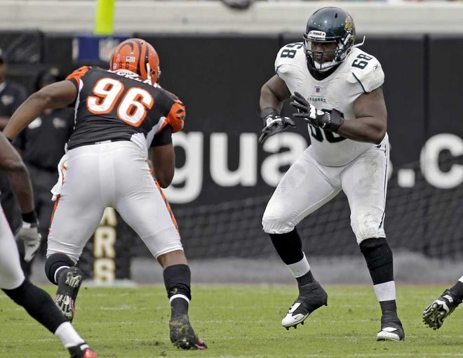 John Raoux Associated Press Jaguars tackle Guy Whimper makes a move to block defensive end Carlos Dunlap in a game against the Bengals. Whimper was among three players the Jaguars released on Wednesday.