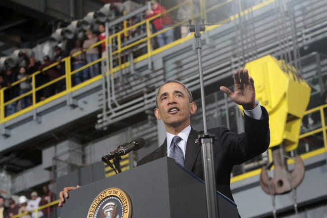 President Barack Obama speaks Tuesday at Newport News, Va., Shipbuilding as part of his public campaign to sway Congress to block automatic spending cuts that are scheduled to begin Friday in defense and domestic programs.