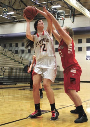 Sturgis' Rachel Anderson avoids contact, shooting a shot from inside Wednesday night.