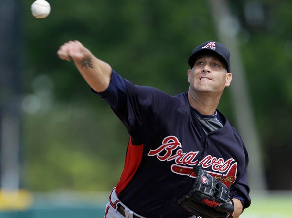 Atlanta Braves starting pitcher Tim Hudson throws a pitch during Wednesday's spring training 
exhibition game against the Detroit Tigers in Lakeland, Fla. (Charlie Neibergall | Associated Press)