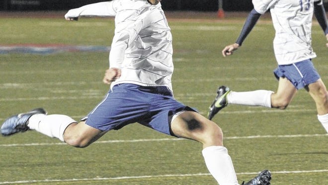 Eric Tan takes a shot at the goal during Westlake’s loss to Bowie Friday. The Chaps lost in a shootout 2-2 (4-3).