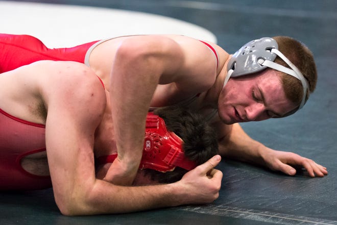 Silver Lake's Tom Grifa wrestles North Attleboro's Peter Kummer in a semifinal match of the Marshfield Holiday Wrestling Tournament held Friday, December 28, 2012 at Marshfield High School.