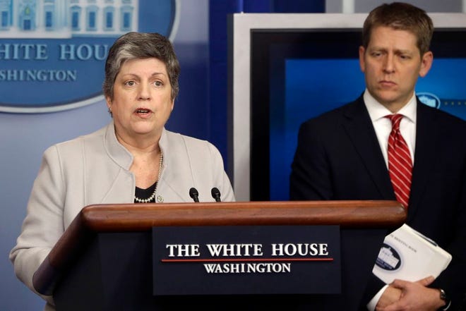 Homeland Security Secretary Janet Napolitano, accompanied by White House press secretary Jay Carney, briefs reporters on the sequester, Monday, Feb. 25, at the White House in Washington. Napolitano said it will lead to increased terrorism risks, detention releases, longer airport lines, less border security and other problems.