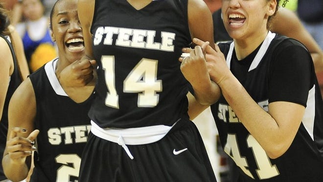 Cibolo-Steele players celebrate their 69-60 victory over Pflugerville in a Class 5A state semifinal at the Erwin Center. The loss on Friday night was the first for the Panthers after 38 straight victories. Credit: Ashley Landis for American-Statesman