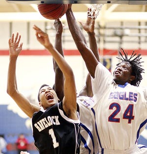 Havelock's Kyran Bowman (1) and West Craven's Tyrone Brown (24) fight for a rebound Friday night.