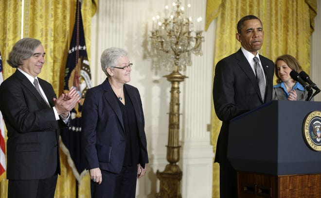 President Barack Obama speaks in the East Room of the White House in Washington on Monday, where he announced will nominate, from left; MIT physics professor Ernest Moniz for energy secretary; Gina McCarthy to head the EPA; and Walmart Foundation President Sylvia Mathews Burwell to head the Budget Office.