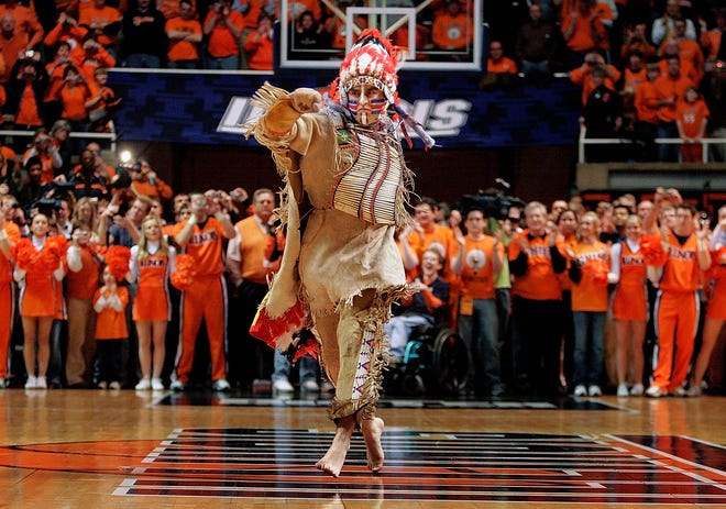 In this Feb. 21, 2007 file photo, Chief Illiniwek, mascot for the University of Illinois, performs for the last time during an Illinois basketball game in Champaign, Ill. (AP Photo/Seth Perlman, File)