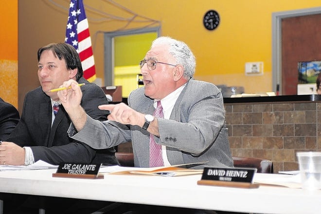 Washingtonville Joe Galante, at right, took heat at the meeting from residents Monday over a FEMA buyout program for those who sufffered damage in Hurricane Irene in 2011. Mayor Hudson is at left.