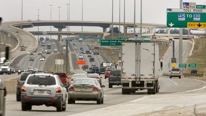 Almost 29,000 people a day commute to Travis County from Hays County, explaining this northbound traffic in late February near the county line on Interstate 35.
