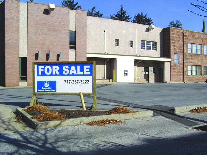 The for sale sign didn't stay up long at the former Susquehanna Bank building.
