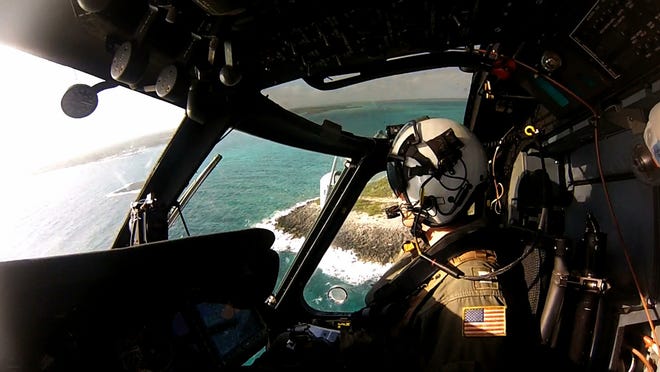 Lt. Matthew Welch of HSM-70 maneuvers his helicopter during a training mission at the Atlantic Undersea Testing and Evaluation Center.