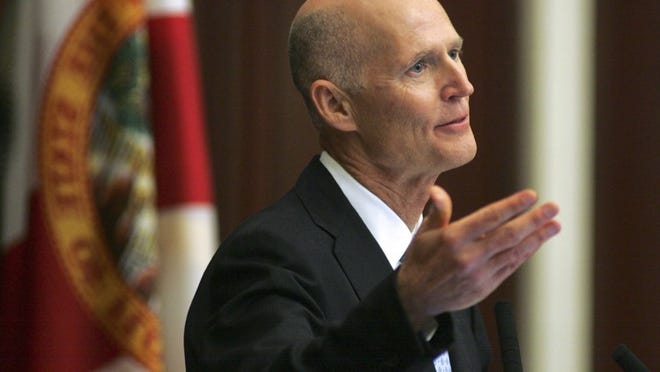 Gov. Rick Scott delivers his State of the State address Tuesday, March 5, 2013, in the Florida House of Representatives in Tallahassee, Fla. The Florida Legislature convened today for its annual 60-day session. (AP Photo/Phil Sears)