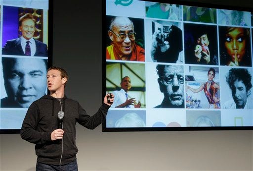 Facebook CEO Mark Zuckerberg speaks at Facebook headquarters in Menlo Park, Calif., Thursday, March 7, 2013. Zuckerberg on Thursday unveiled a new look for the social network's News Feed, the place where its 1 billion users congregate to see what's happening with their friends, family and favorite businesses.(AP Photo/Jeff Chiu)