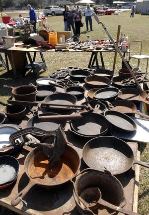 Terry.Dickson@jacksonville.com  Cast iron cookware is a staple at many of the stops on the Peaches to the Beaches yard sale that runs from Forsythe to St. Simons Island.