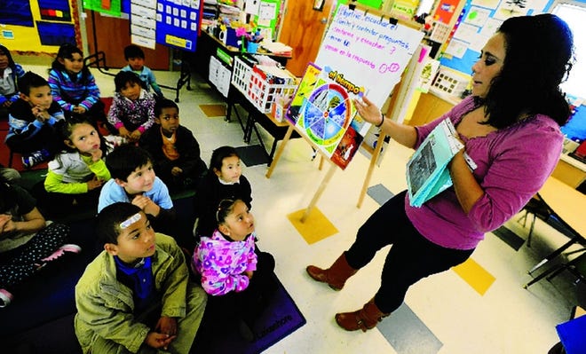 Brenda Rodriguez quizzes children in her kindergarten class Tuesday morning at Pittman Charter School in Stockton. Pittman operates a dual-language Spanish-English immersion program. 
The optimal enrollment for kindergarten in such a program is 50% English speakers and 50% spanish speakers. But the program, a few years old, has had trouble finding enough English-only speakers.