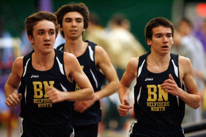 Belvidere North's Tyler Yunk (from left), Garrett Lee and Paxson Menard approach the finish line of the 3200 meter run Wednesday, March 13, 2013, during the NIC-10 boys indoor track championship meet at Hononegah High School in Rockton. Menard finished in first followed by Yunk in second and Lee in third.