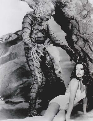 Julie Adams with suited-up Ben Chapman in "Creature from the Black Lagoon" filmed in Florida and California.