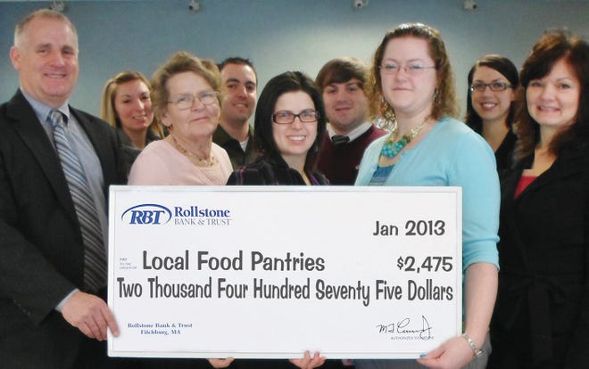 Pictured (left to right, front row) – Jim Adams,VP at RBT; Ginny White of Ginny’s Helping Hands; Joana dos Santos, Executive Director of Cleghorn Neighborhood Center Kristina Wilson, Board Member of Townsend Ecumenical Society; Heather Sarasin, Branch Manager and Assistant VP at RBT; (back row) – Nicole Kalloch, Nick Caravella, Robert Courtemanche, and Heather Finnerty of RBT.