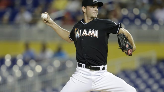 Miami Marlins starting pitcher Jacob Turner throws in the first inning during a baseball game against the Cincinnati Reds, Friday, Sept. 14, 2012, in Miami. (AP Photo/Lynne Sladky)