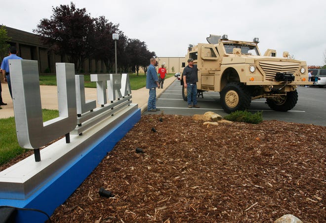 Ultra employees look at an armored vehicle at the plant in 2009. (Star file photo)